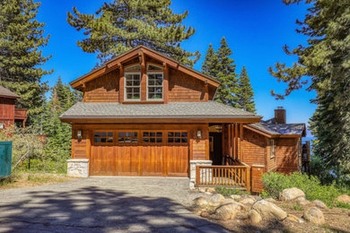 Example of a beach style home design design in Sacramento