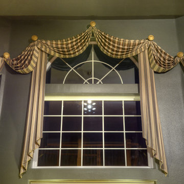 Speciality shaped windows drapery treatment