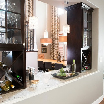 Bar Cut-Out Separating Kitchen and Dining Room