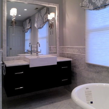 Ebony and Carrera Bath
