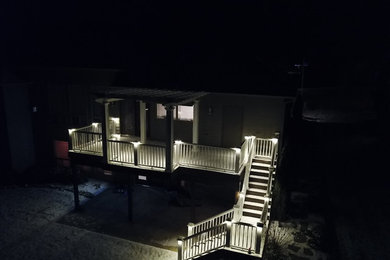 Deck - backyard deck idea in Other with a pergola