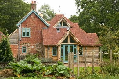 Photo of a country two-storey exterior in Hampshire.