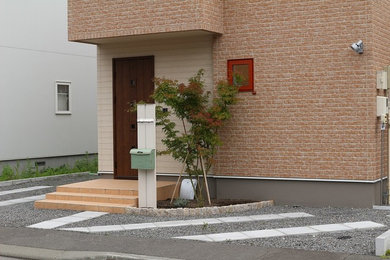 札幌にあるカントリー風のおしゃれな家の外観の写真
