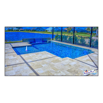 (Rennehan) FT MYERS FL Superior Pools Swimming Pool With Raised Wall & Waterfall