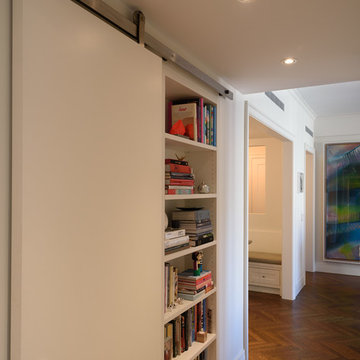 Pre-War Hallway with Bookcase and Hidden Washer/Dryer