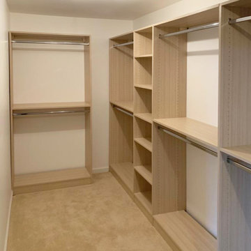Light wood color walk-in closets shelf compartment closet