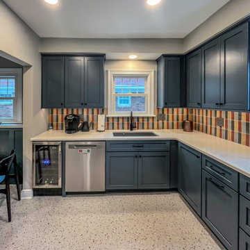 Vibrant and Colorful Kitchen with Custom Cabinetry and Calacatta Duolina Quartz