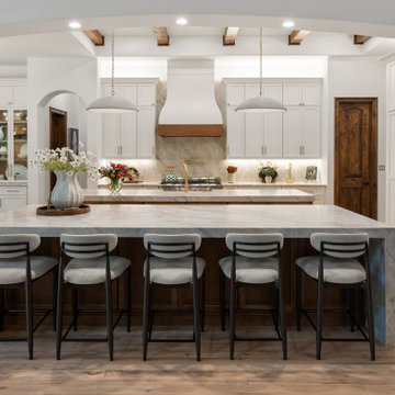 Symmetrical Kitchen Elevation with Taj Mahal Quartzite Waterfall Island and Larg