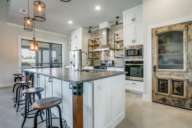 Inspiration for an industrial home design remodel in Dallas