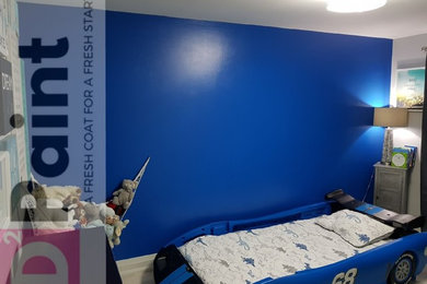 Boys room feature blue wall