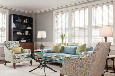 Inspiration for a mid-sized modern formal and enclosed dark wood floor and brown floor living room remodel in Boston with gray walls
