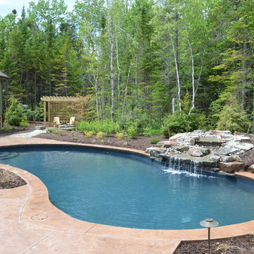 Freeform pool with waterfall