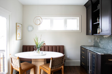 Mid-sized mid-century modern single-wall brown floor kitchen photo in Minneapolis with shaker cabinets, dark wood cabinets, quartzite countertops and blue countertops