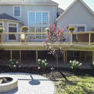 Deck and Unilock Paver Patio with Firepit & Landscaping