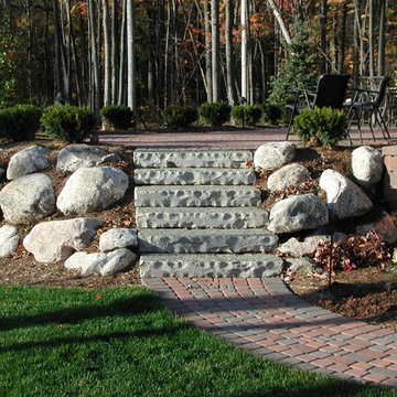 Front yard landscaping with back yard patio and pond