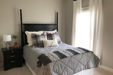 Inspiration for a mid-sized transitional guest carpeted and beige floor bedroom remodel in Baltimore with gray walls and no fireplace