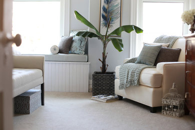 Inspiration for a mid-sized transitional master carpeted bedroom remodel in Toronto with white walls