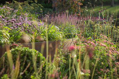 マンチェスターにあるカントリー風のおしゃれな庭の写真