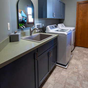 Updated Laundry Room with Stormy Medium-Blue Cabinets