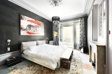 Design ideas for an eclectic bedroom in Lyon with black walls, a standard fireplace and grey floor.