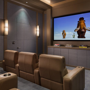 Inspiration for a classic enclosed home cinema in Miami with brown walls, carpet and grey floors.