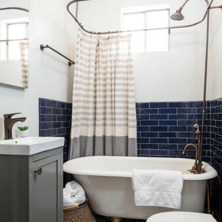 Inspiration for a small transitional kids' blue tile and ceramic tile cement tile floor, white floor, single-sink and tray ceiling bathroom remodel in Denver with shaker cabinets, gray cabinets, a one-piece toilet, white walls, a pedestal sink, quartz countertops, white countertops and a freestanding vanity