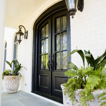 An Exceptional Entryway Featuring Traditional Custom Doors