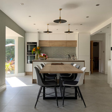 Scandi oak and white open plan family kitchen.