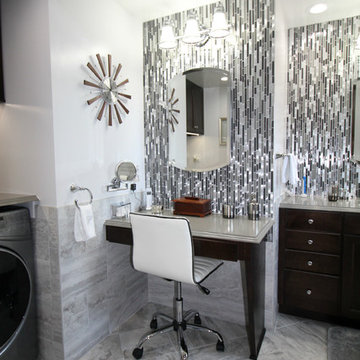 Master Bathroom with dressing table, washer and dryer.