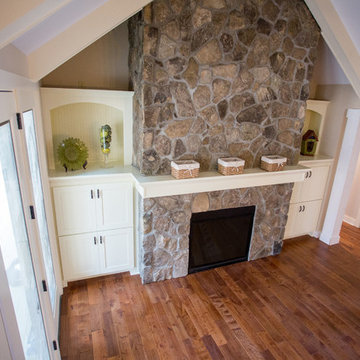 Fireplace flanked with Bookshelves