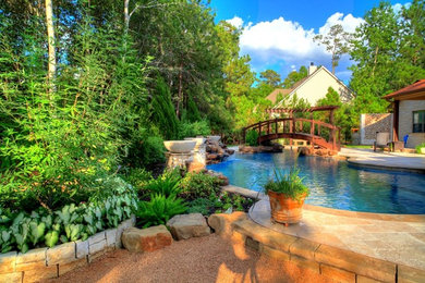 Inspiration for a rustic pool remodel in Houston