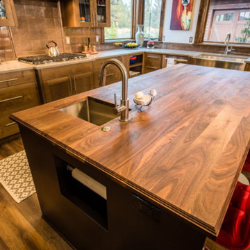 Walnut Wood Island Countertop and Copper Backsplash