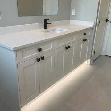 Bathroom renovation with new white sink vanity cabinet