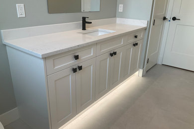 Bathroom renovation with new white sink vanity cabinet