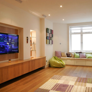 This lovely contemporary family and tv room, within the basement