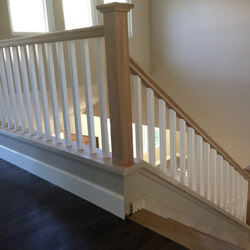 Craftsman stair, white oak & paint grade.