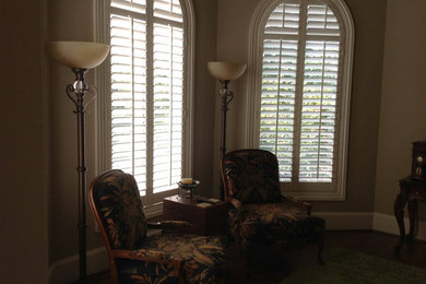 Example of a small classic formal and enclosed living room design in Birmingham with beige walls, no fireplace and no tv