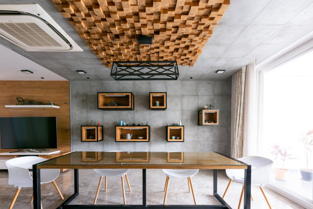 Contemporary Dining Room by Karthik Hatkar