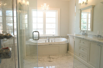 Drop-in bathtub - transitional gray tile drop-in bathtub idea in Toronto with a drop-in sink, quartzite countertops and white walls