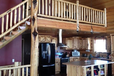 Inspiration for a mid-sized rustic wooden straight wood railing staircase remodel in Other with wooden risers
