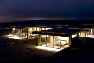 Example of a minimalist exterior home design in Other