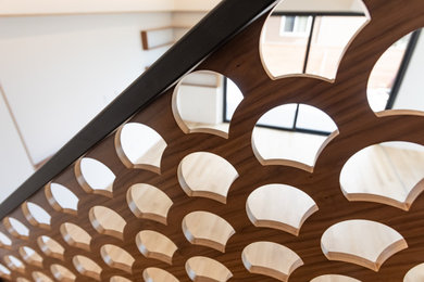 Example of a mid-sized wood railing staircase design in San Francisco