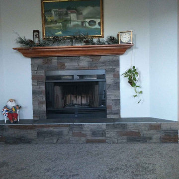 Kenai Stacked Stone Corner Fireplace Design