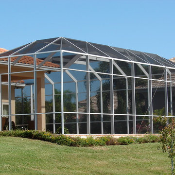 Mansard roof style pool enclosure