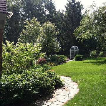 Backyard Path with Wooden Arbor