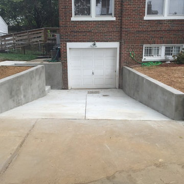New Concrete Driveway Entrance, Retaining Walls, and New Iron Fence