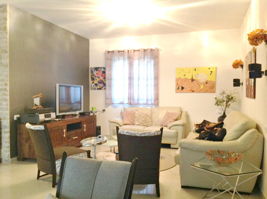 deep gray wallpaper to set off creamy couches