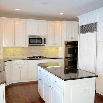 After Photo -Oak Cabinets in Kitchen Refinished White