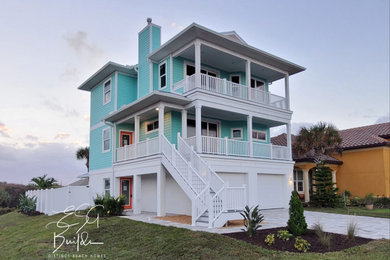 Inspiration for a coastal house exterior in Orlando.
