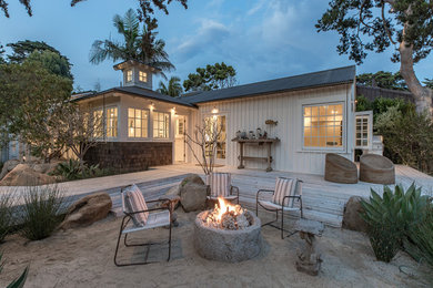 Design ideas for a mid-sized beach style backyard patio in Santa Barbara.